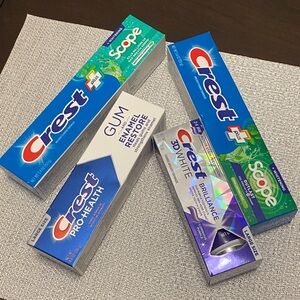 Crest Toothpaste Collection with Blue and Purple Packaging